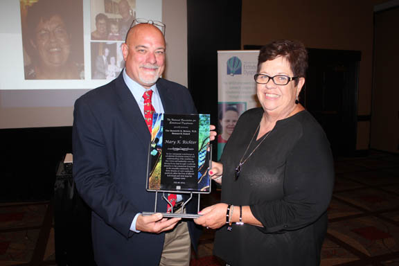 Dr. Tim Fete presents the Ken Brown Research Award to Mary K. Richter.