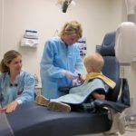 Keegan sits patiently in the dentist chair.