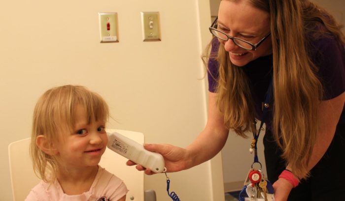Nurse Taking Goltz Girl Temperature