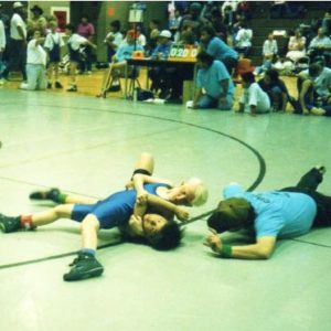 Cody pins a wrestler.