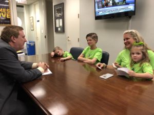 Walker family meets with a Louisiana legislator.