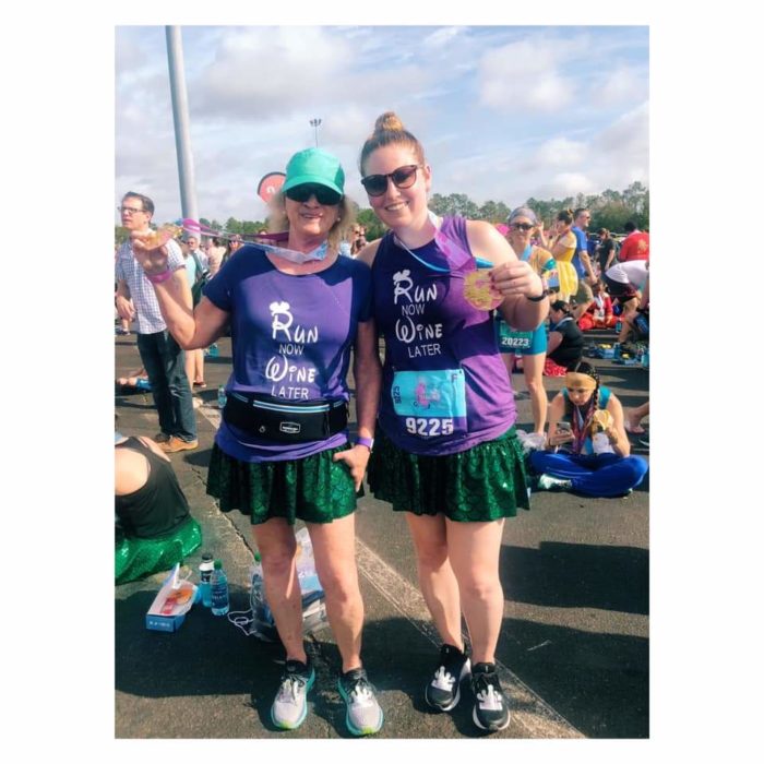 Suzanne and Caitlin show off their medals for finishing the race and have the medals to prove it!