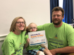 Christine, her son, and her husband advocating for the Ensuring Lasting Smiles Act at the 2018 Day On the Hill.