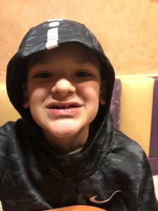 Isaiah smiles for the camera.