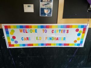Colorful banner that reads 'Welcome to Carter's CARE E.D. Fundraiser'.