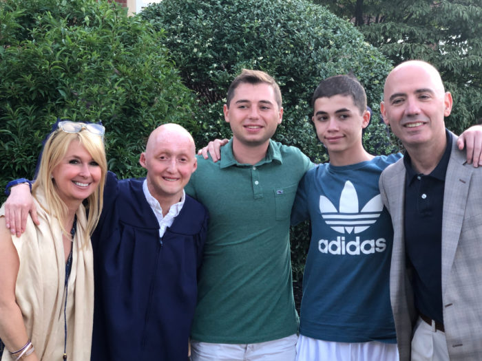 The Geismar family poses at Ryan's graduation.