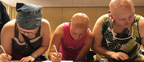 Family signing research consent forms