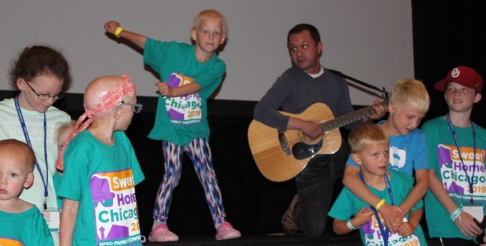 Dancing on stage at Kays' Kids Camp in 2019