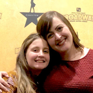 Veronica has arm around her daughter, Sofija.