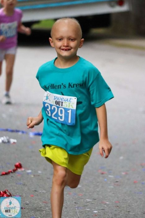 Kellen, affected by ectodermal dysplasia, runs during an NFED 5K fundraiser.