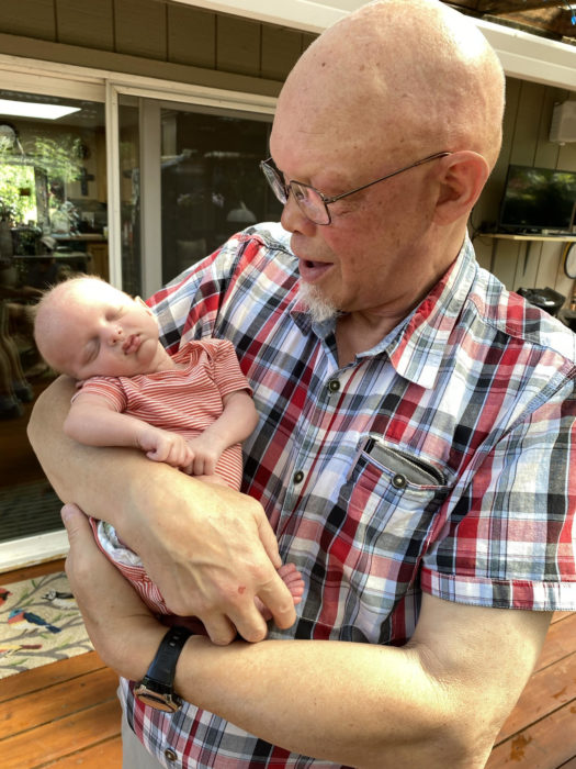 Richard holds his grandson, Bennett, who received the XLHED treatment in utero.