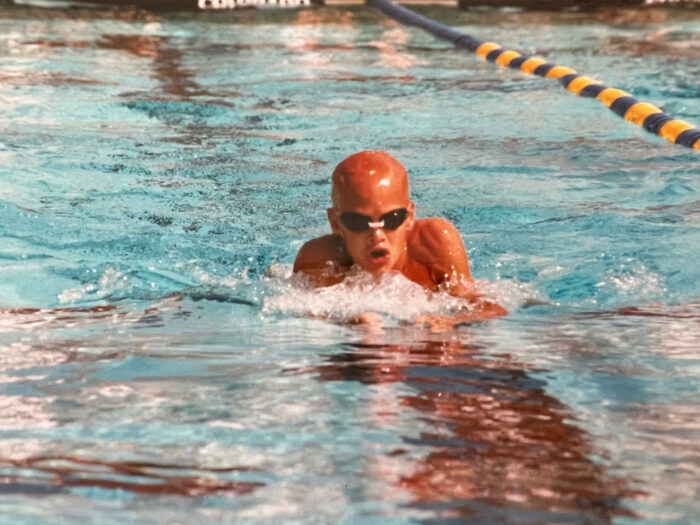 Adam in the pool. He swam at the national level before running marathons.
